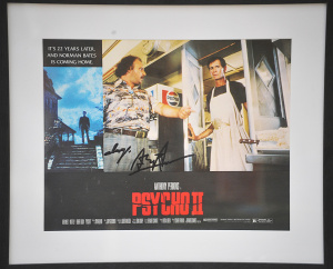 Lot 126 - Framed Psycho II (1983) lobby card (card size 34cm W x 26cm H), signed