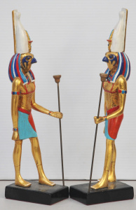 Lot 160 - Pair of gilt Egyptian God Horus statuettes - 33cm H - Note cracks sigh