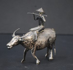 Lot 164 - Eastern silver figurine of farmer on water bison - 11cm L - approx 65g