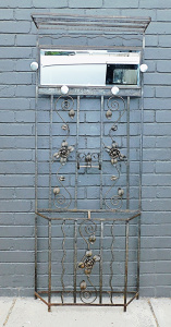 Lot 51 - Mid-century mirrored wrought iron hall stand with rose details & ti