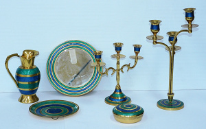 Lot 102 - Group lot Brass & Enamel ware inc 2 x Three arm candlesticks, Pitc