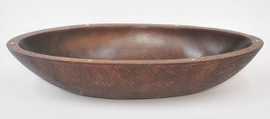 Lot 188 - Intricately carved vintage Trobriand Island oval bowl with shell inlay