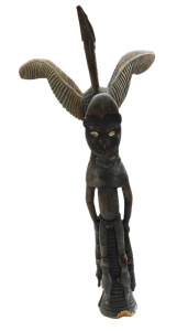 Lot 36 - Sepik tribal wood, shell and fibre statue of figure with bird, crocodil