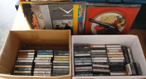 Lot 48 - 2 x Boxes of Cassettes, Vinyl LPs & Vinyl Singles incl Warren Zevon