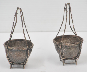 Lot 127 - Pair Eastern Silver Basket weave shaped Salt cellars approx 120gms TW