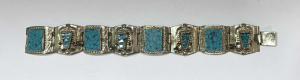 Lot 135 - Vintage Taxco Mexican Sterling Silver Bracelet - decorative set with T