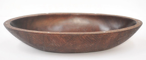 Lot 149 - Intricately carved vintage Trobriand Island oval bowl with shell inlay