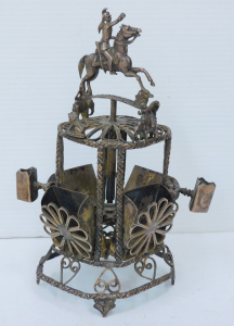 Lot 169 - Anglo-Indian white metal mechanical cigarette holder with mounted figu