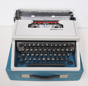 Vintage Cased Olivetti Dora Portable Typewriter in Grey