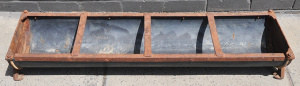 Lot 5 - Vintage J Furhpy & Sons cast iron framed pig trough, branding to bot