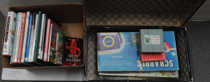 Lot 24 - Box lot of toy reference books and a vintage suitcase full of vintage g