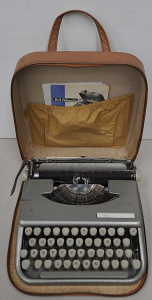 Lot 66 - Mid-century grey hammer tone HG Palmer portable typewriter in travel ca