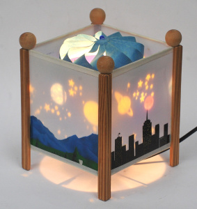Lot 75 - c1998 Skansen Motion Lamp - Square shape w Cityscape to 2 sides & C