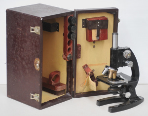 Lot 147 - Vintage Bausch & Lomb microscope in original case with additional