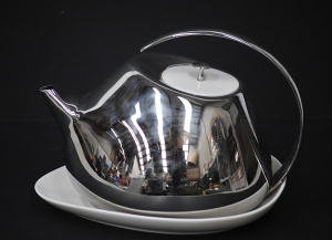 Lot 235 - Georg Jensen Helena Rohner Polished stainless steel teapot with white