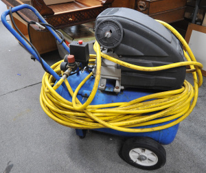 Lot 21 - Industrial Mastercraft Value air compressor with long hose