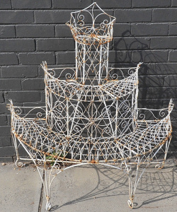 Lot 66 - Victorian Wire Work half circle three tier plant stand - scroll design