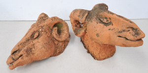Lot 95 - Pair of Laruen Berkowitz (b 1965) unsigned terracotta rams' heads (long