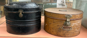 Lot 21 - 2 x vintage metal hat boxes, round and oval