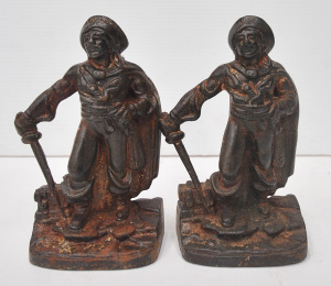 Lot 151 - Pair of Cast Iron Bookend Figures of a Swashbuckling Pirate