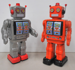2 x vintage style Tin Toy Space Robots - Orange & Grey, no makers details si