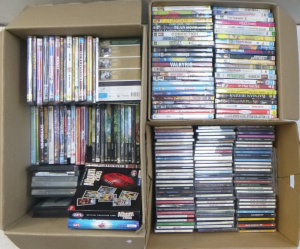 Lot 47 - 3 boxes of DVDs (Borat, Monsters Inc, Walk the Line etc) and CDs (Savag