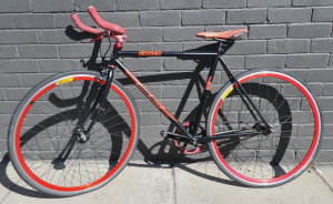 Lot 59 - SE Lager Fixed Gear Bicycle In Red & Black w Deep V Road Wheels - M