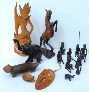Lot 97 - Group of exotic wooden carvings inc Balinese teak Rathi and Kala Rau (3