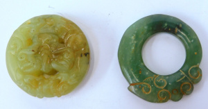 Lot 156 - 2 x vintage Chinese carved jade pendants inc 1 depicting lions - large