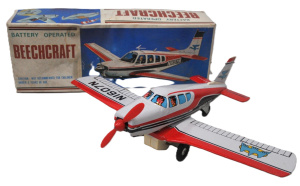 Lot 124 - Vintage Boxed Japanese Tin Toy Beechcraft Aeroplane - Battery Operated