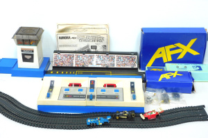 Lot 023 - Box lot - Vintage AFX Aurora Data Race part slot Car Racing set - Soun