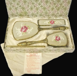 Lot 085 - 1960s boxed new Delina Dresser set - 5 pces, brushes, mirror, comb wi