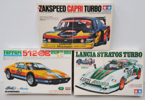Lot 126 - 3 Japanese vintage unmade model cars complete with instructions, decal