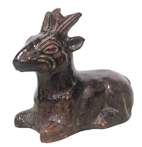 Lot 130 - Substantial vintage terracotta sitting fawn with Rockingham type brown