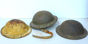 Lot 090 - 3 x early 20thC BritishCommonwealth army helmets (WW1WW2 era), 1 yello