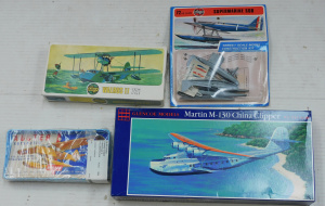 Lot 121 - 4 x Vintage unmade model kits of sea planes complete with instructions