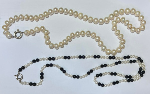 Lot 170 - 2 x long pearl necklaces - long strand of large freshwater pearls &amp
