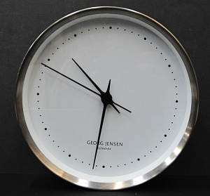 Lot 191 - Goerg Jensen Koppel stainless steel Wall Clock - working, 22cms D