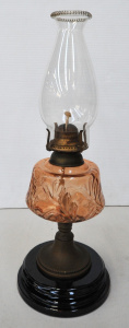 Lot 114 - Vintage embossed peach glass and brass kerosene lamp with black lacque