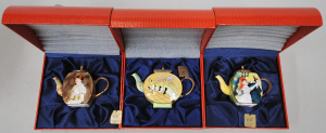 Lot 181 - 3 x Boxed Charlotte di Vita Miniature Enamel Teapots inc T-Lautrec Dan
