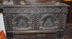 Lot 003 - Large vintage heavily Ebonised Teak Trunk - heavily carved front &