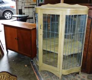 Lot 062 - Vintage serpentine lead light cabinet with key (120cm H - note crack t