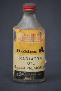 Lot 126 - Vintage Holden Radiator Oil 4 oz bottle with partial contents and gen