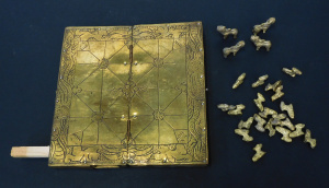 Lot 183 - Vintage Brass Bagh-Chal (Tigers & Goats) with Brass Tiger & Go