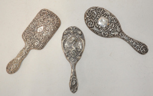 Lot 222 - 3 x Hallmarked Sterling Silver hand held mirrors - Repouss patterns in