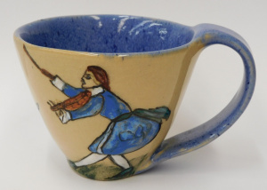 Lot 230 - Vintage Pat Phillips Australian Pottery Cup - hand painted with violin