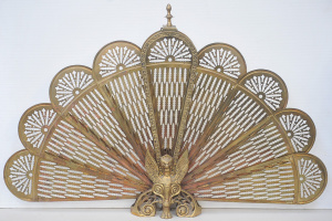 Lot 002 - Vintage Art Deco folding brass peacock fire screen featuring griffons