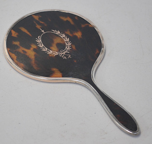 c1922 Hallmarked Sterling Silver & Tortoise shell Hand Mirror with silver in