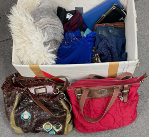Lot 012 - Box lot incl ladies clothing, wool cape, evening dresses, Fossil tote,