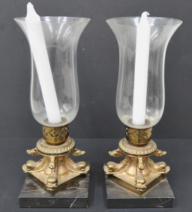 Lot 192 - Pair of Classical style gilt brass and marble hurricane lamp candlesti